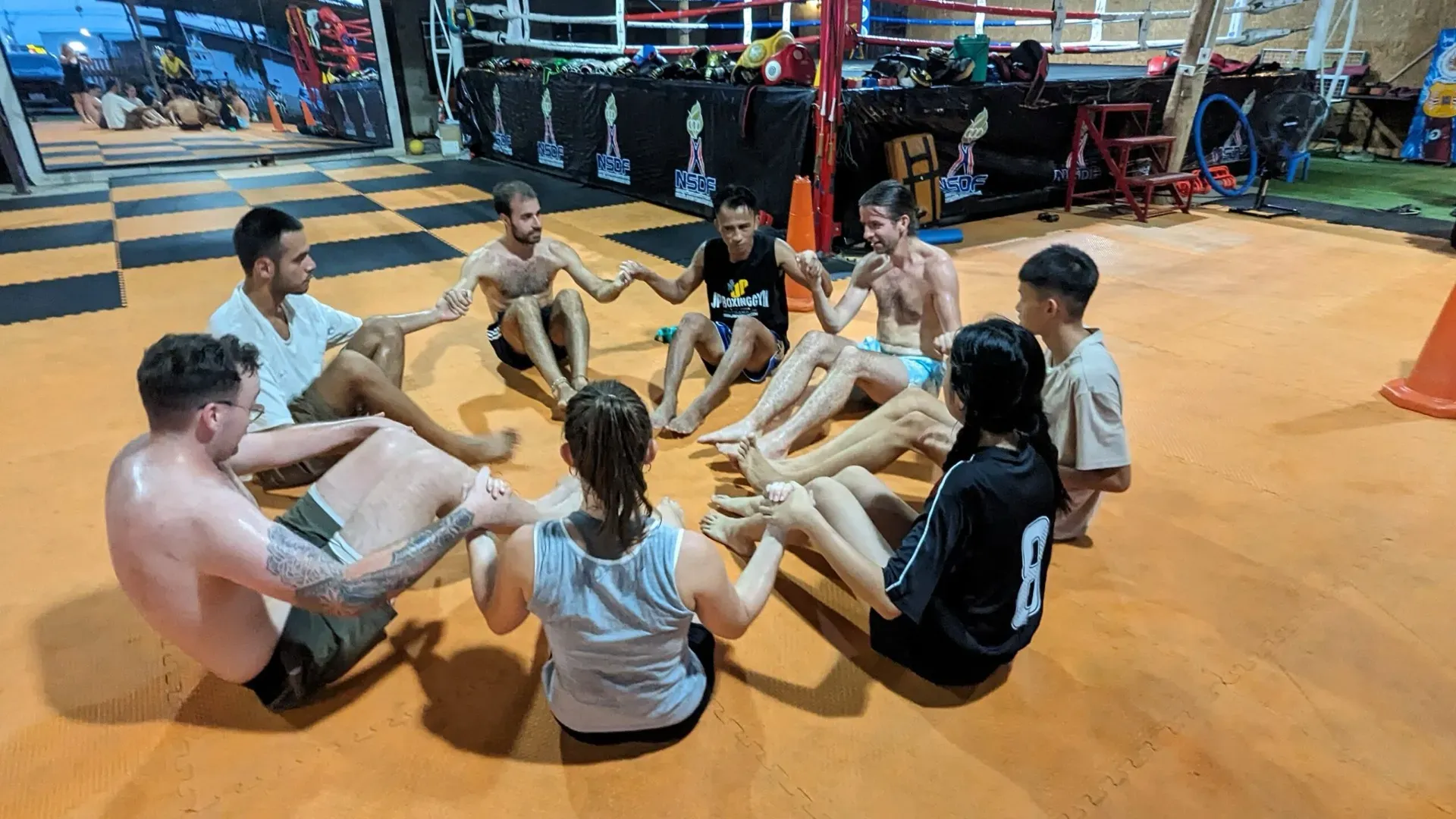 Group photo of Muay Thai fighters and students