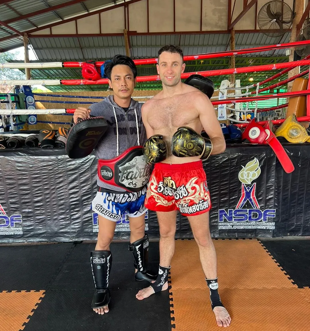 Kru Jay with a Thai fighter in the ring