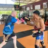 Two fighters sparring inside ring