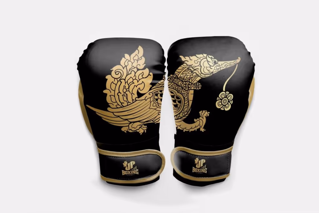 Muay Thai gloves resting on wooden stool